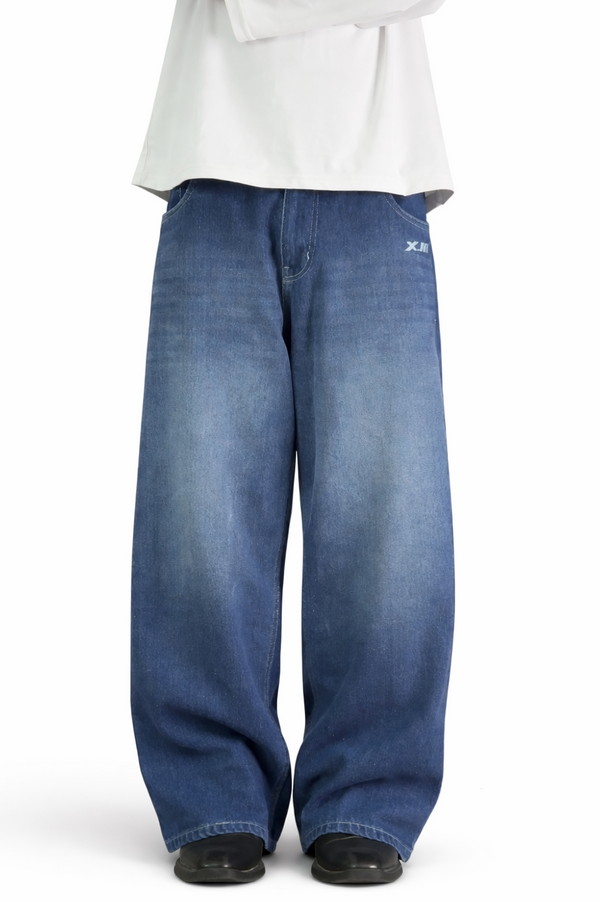 Person wearing blue jeans and a white shirt on a white background