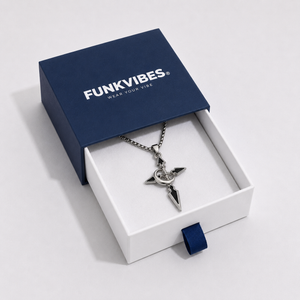 Silver necklace with a star pendant in a 'Funkvibes' branded box on a light gray background