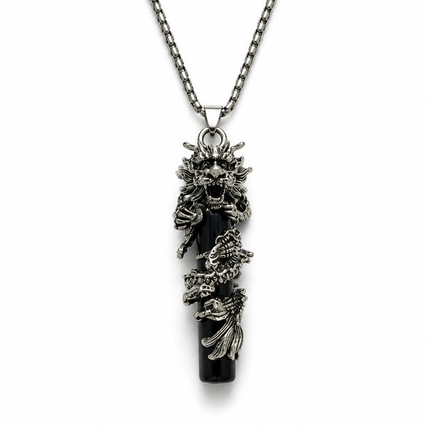 Decorative necklace with intricate designs on a white background