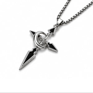 Metallic pendant necklace on a white background